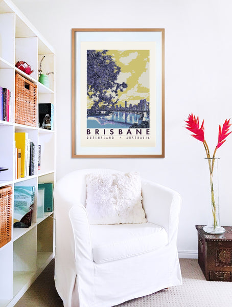 Brisbane River with Jacaranda poster print in wooden frame with armchair