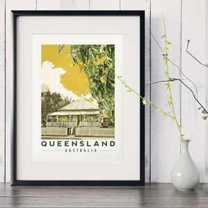 Queenslander house with mango tree poster art print in black frame with white vase